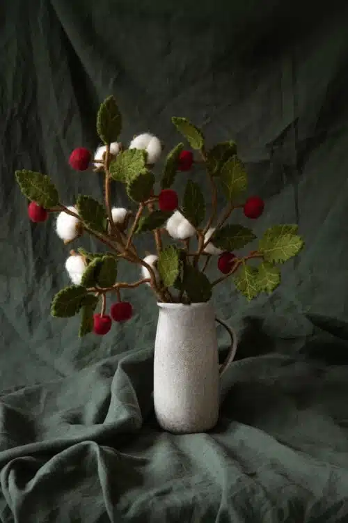 Tak vilt met donkerrode appeltjes